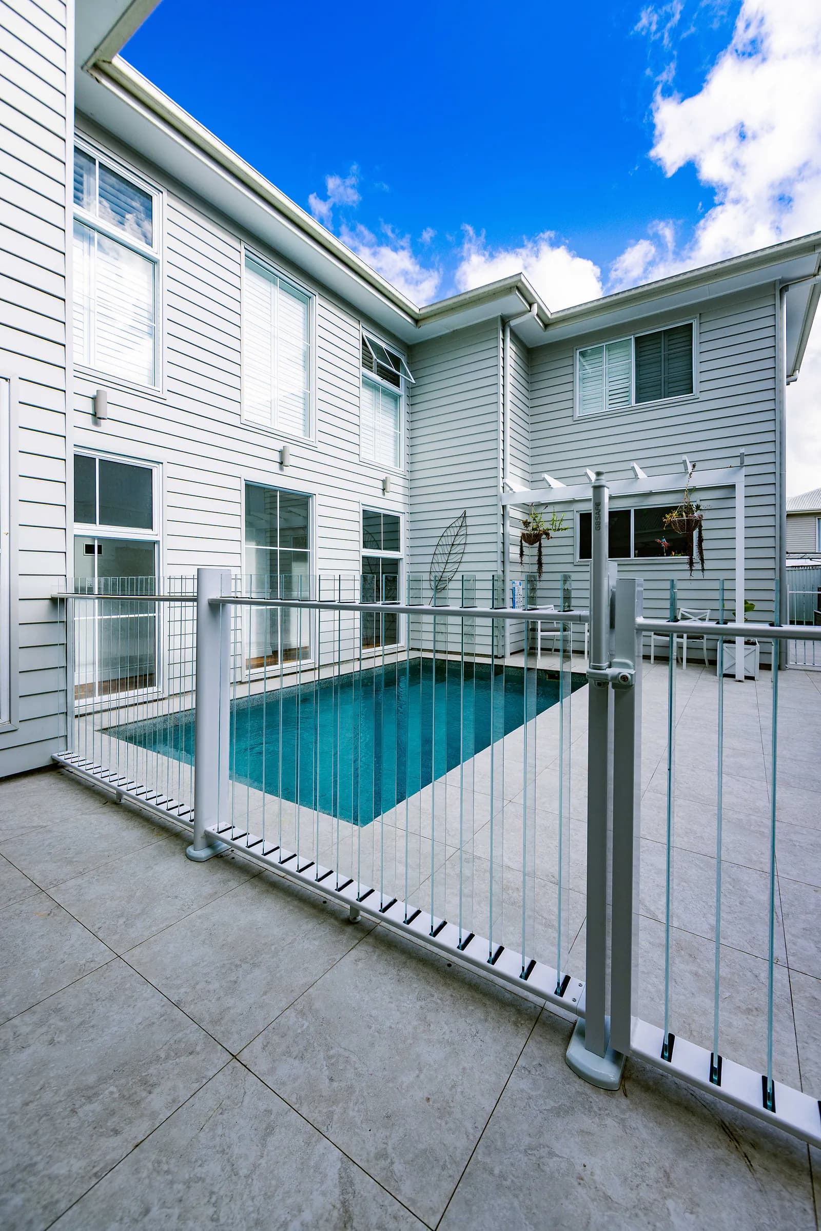 White Flo Glass pool fence